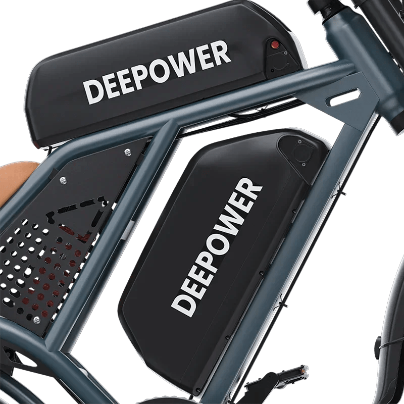 Close-up of DEEPOWER electric bike frame with dual black battery packs labeled DEEPOWER