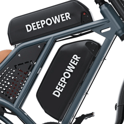 Close-up of DEEPOWER electric bike frame with dual black battery packs labeled DEEPOWER