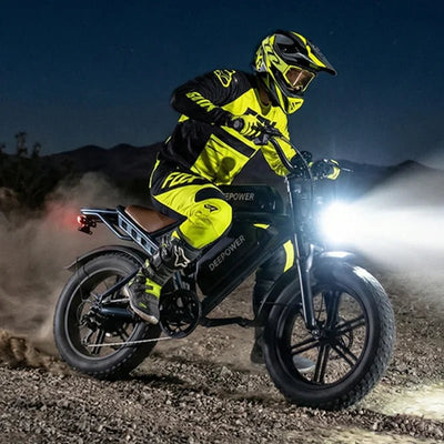 Rider on DEEPOWER QS7 fat tire electric bike riding off-road at night
