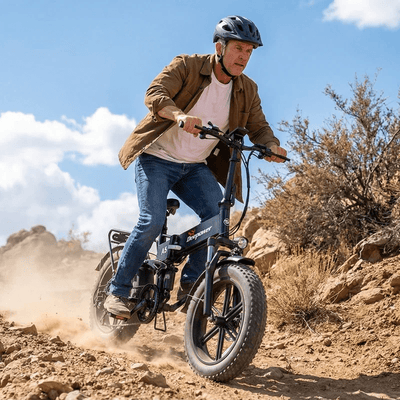 Adult man riding Deepower A5 folding fat tire electric bike on rocky trail